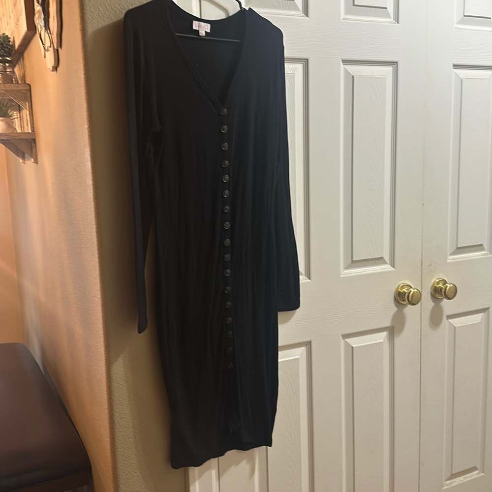 Pink Lilly button up Black Midi knit Dress in a Large.